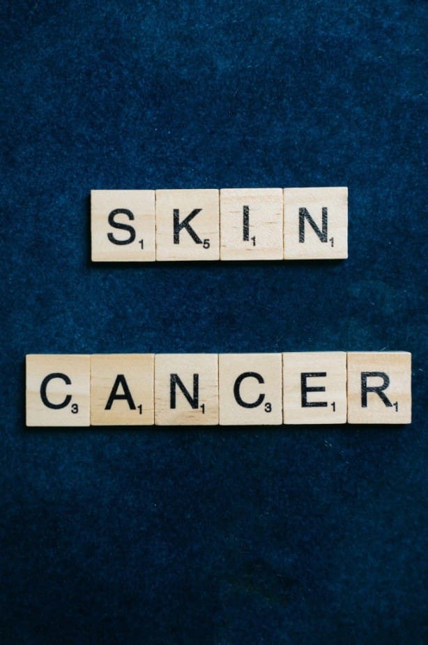 letters spelling out skin cancer